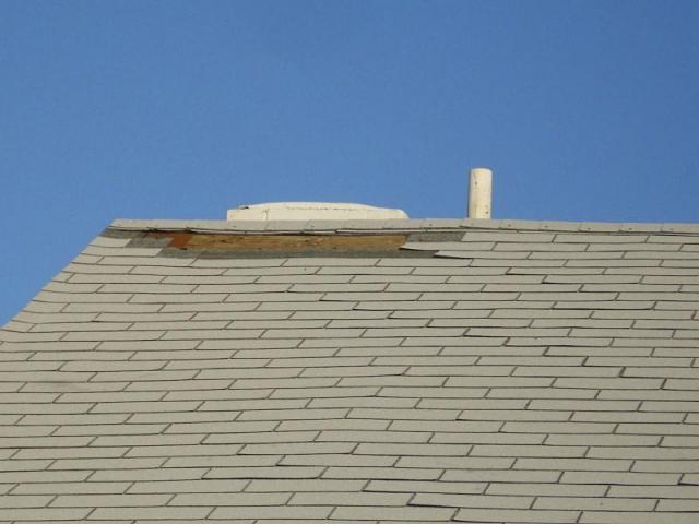 Wind damaged roof